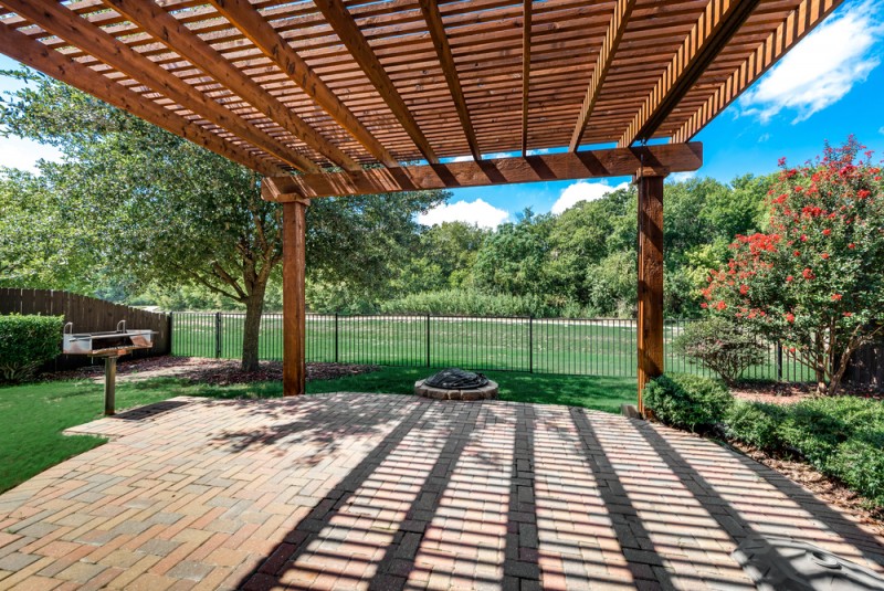    Serene Backyard with Gazebo Covered Brick Paver Patio 