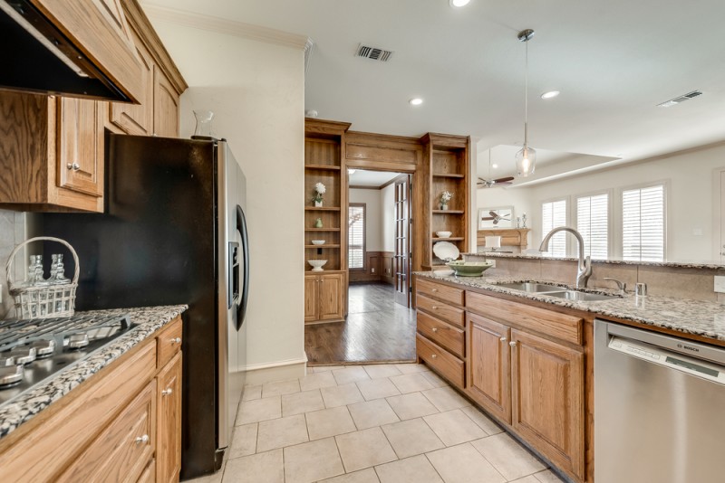    Stainless Steel Appliances and Floor to Ceiling Built Ins 
