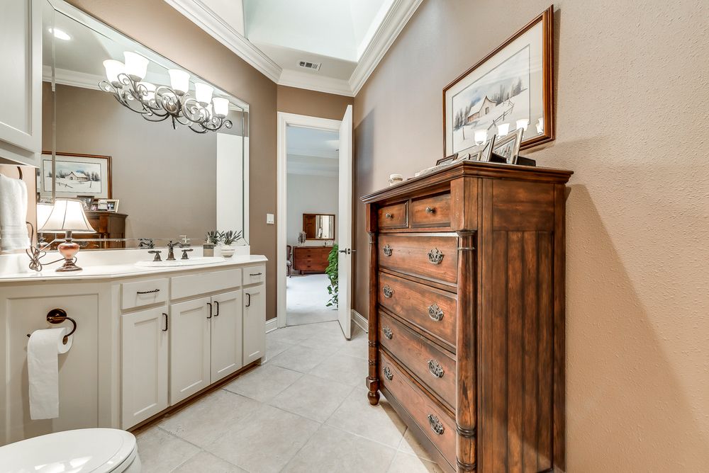    Master Bath has His   Hers Bathrooms and Separate Jetted Tub and Shower Area 