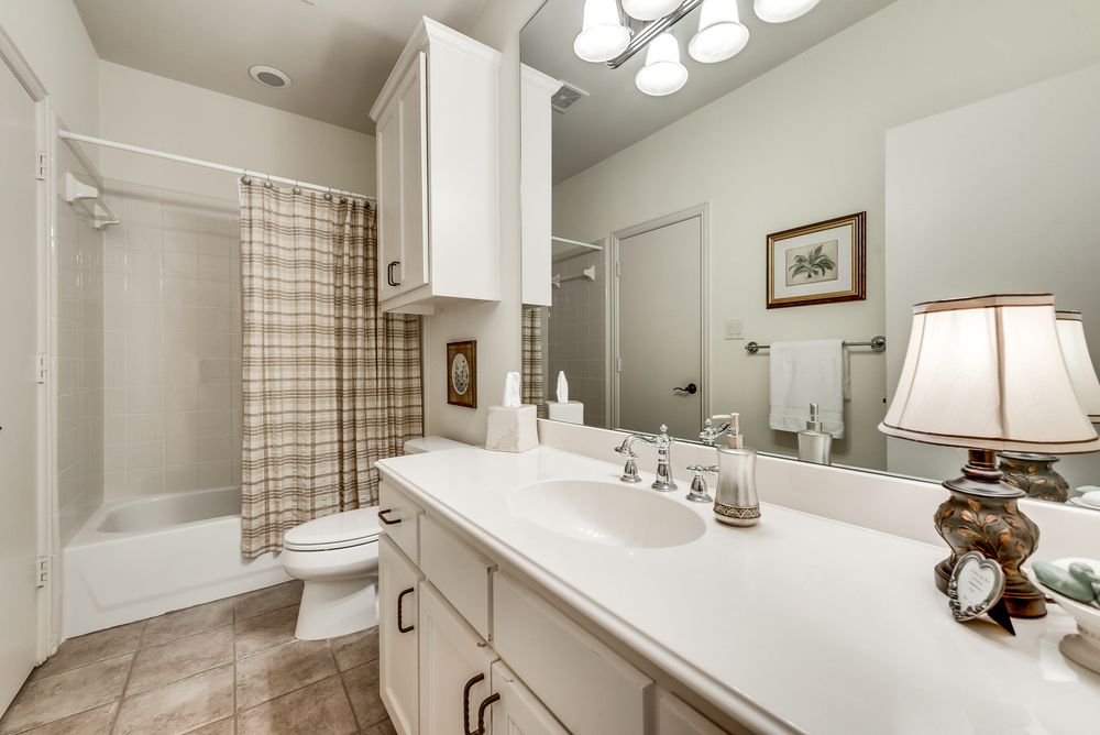    Second Full Bathroom with Hall and Guest Bedroom Entries 