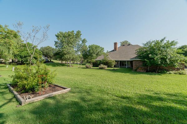    Backyard Oasis with large grassy area 