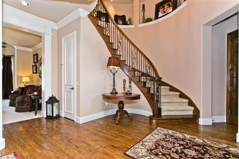    Foyer with Sweeping Staircase 