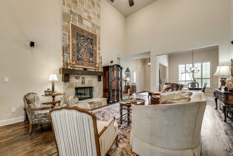    Inviting Family Room with Gorgeous Stone Fireplace 