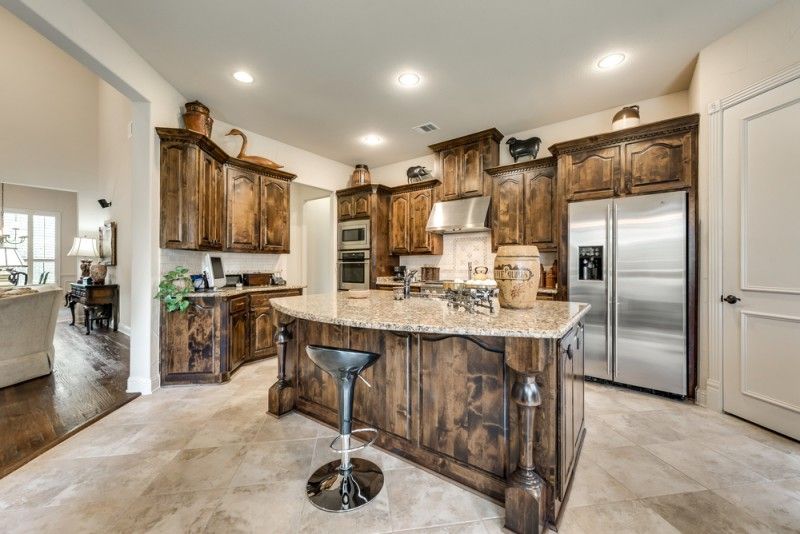    Gourmet Kitchen with Granite Countertops and Large Island 