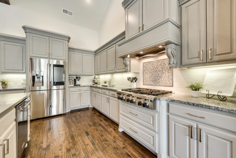    Stainless Steel Appliances Including a Commercial Kitchenaid   Burner Gas Cooktop 