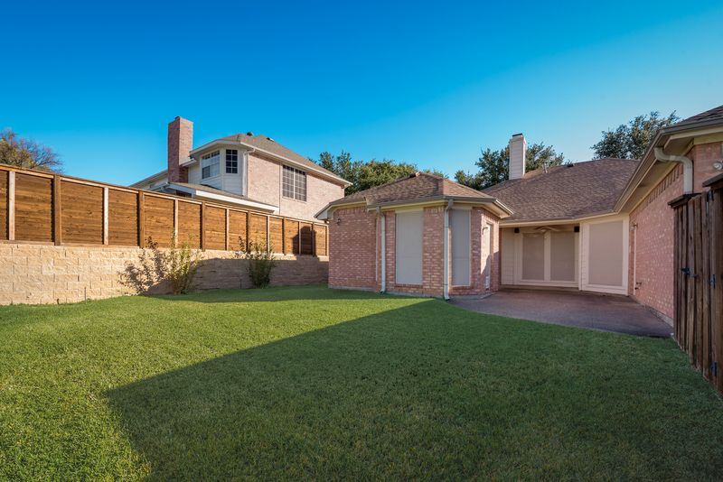   Backyard with Open Patio 