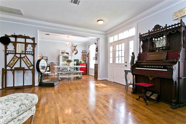    Hardwoods flow from Living into Formal Dining 