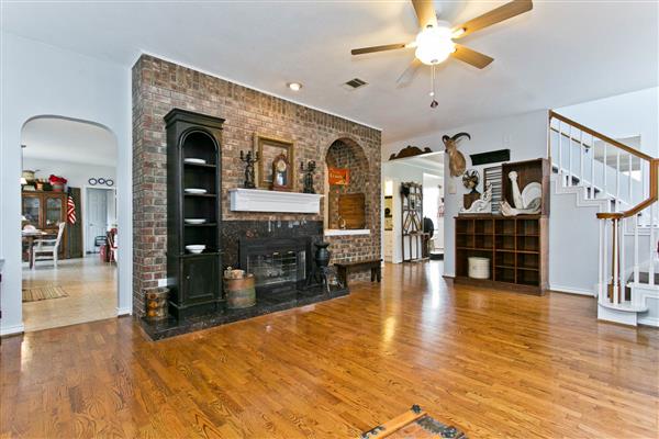    Brick Fireplace with Granite Frame and Base 