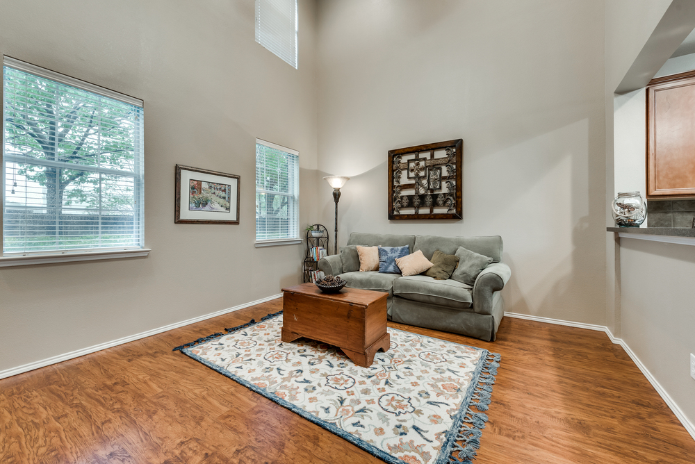    Inviting Family Room with Hardwood Floors and Soaring Ceilings 