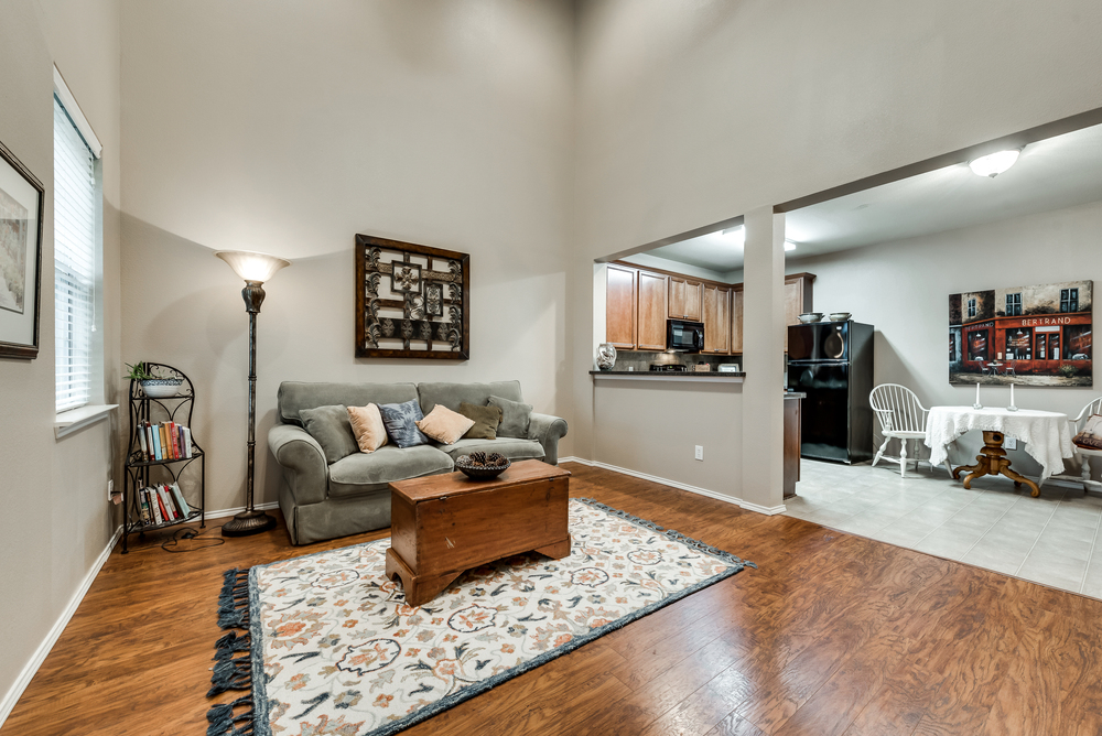    Inviting Family Room with Hardwood Floors and Soaring Ceilings 
