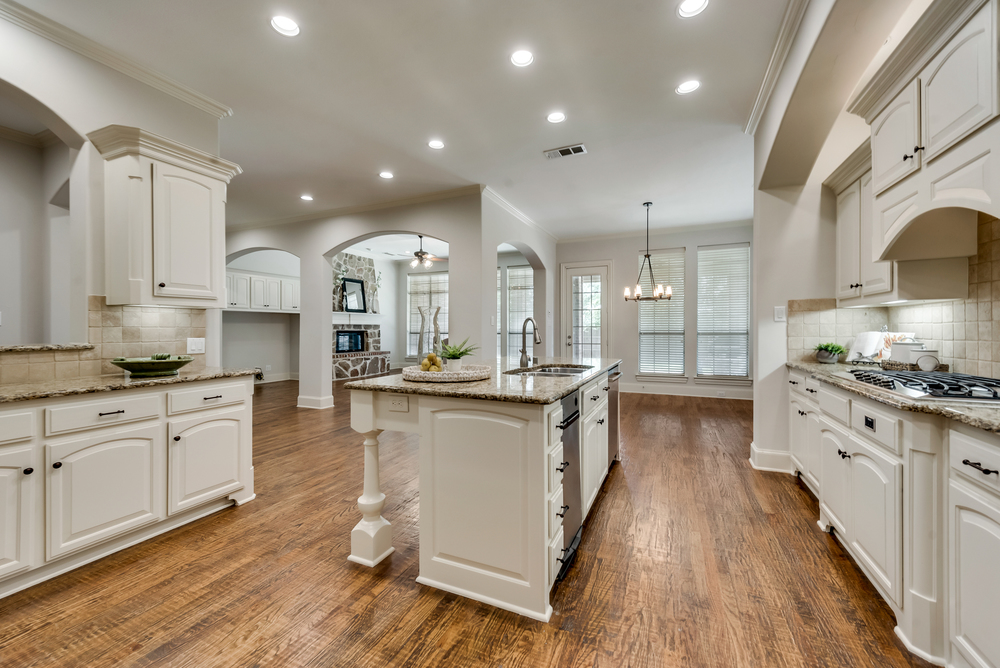    Gourmet Kitchen opens to Breakfast Area and Family Room 