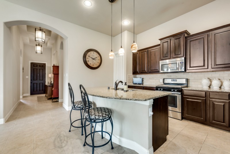    Chef s Kitchen with Granite and Stainless Steel Appliances 