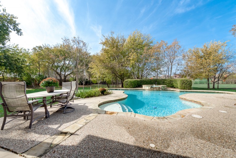    Extended Patio and Sparkling Swimming Pool 