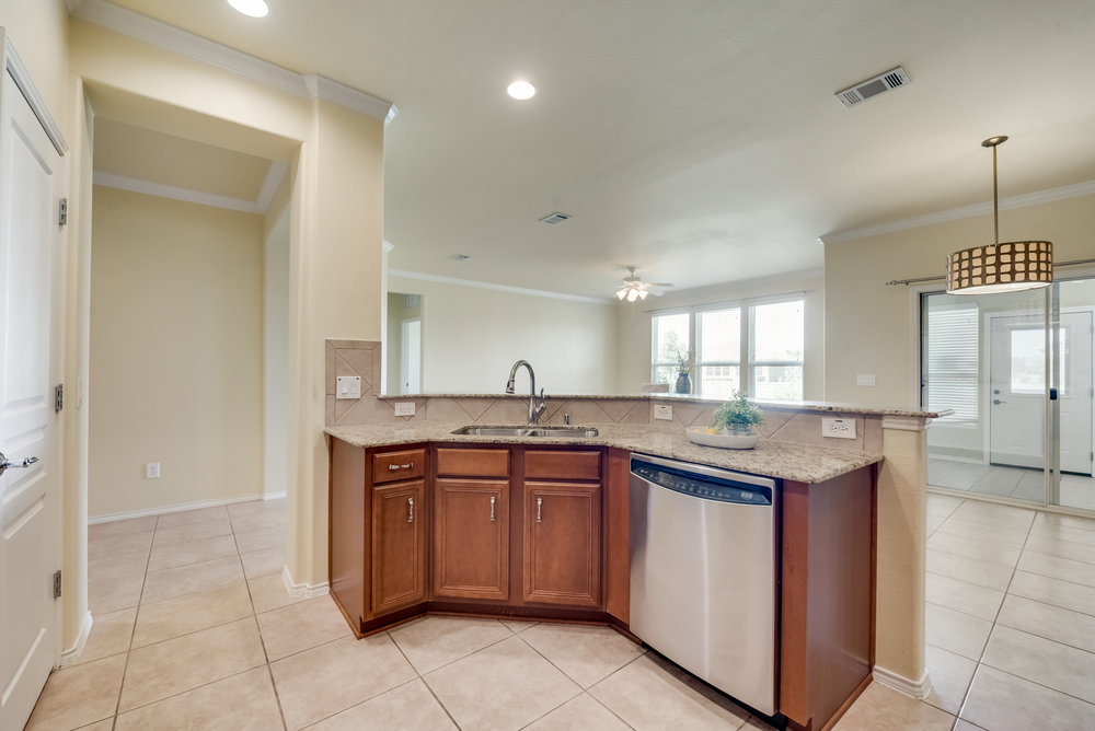    Kitchen also includes Under Mount Sink and Stainless Steel Appliances 