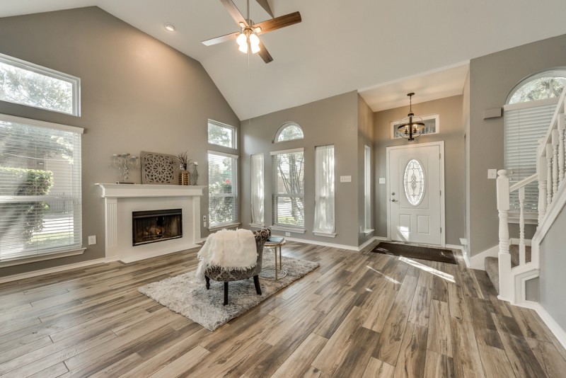   Entry opens into Family Room with Wood Burning Fireplace 