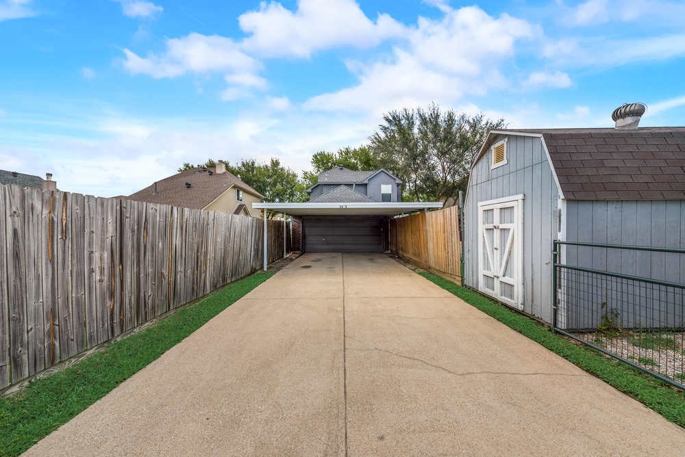    Rear Entry Garage with    Foot Carport and Extended Driveway 