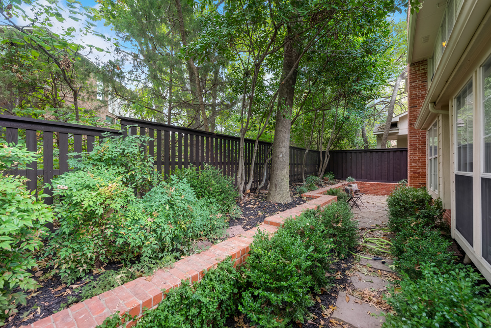    Shady Backyard features Mature Trees for Great Shade 