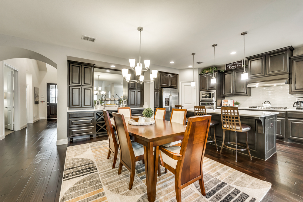    Formal Dining Area with Chic Chandelier and Built In Hutch 