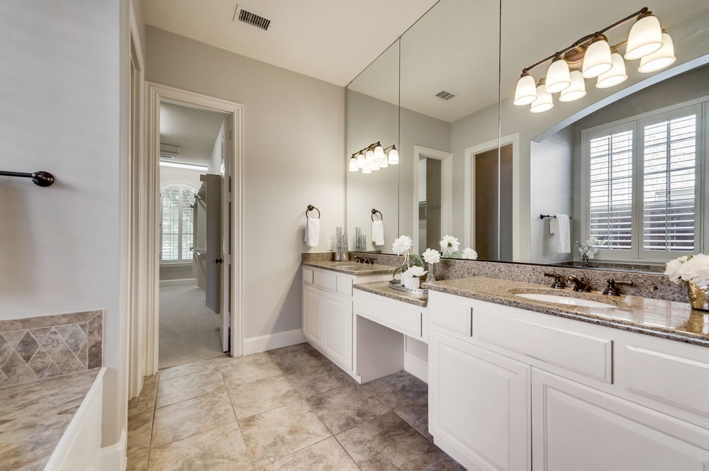    Spa Like Master Bathroom features Granite Countertops and Double Sinks 